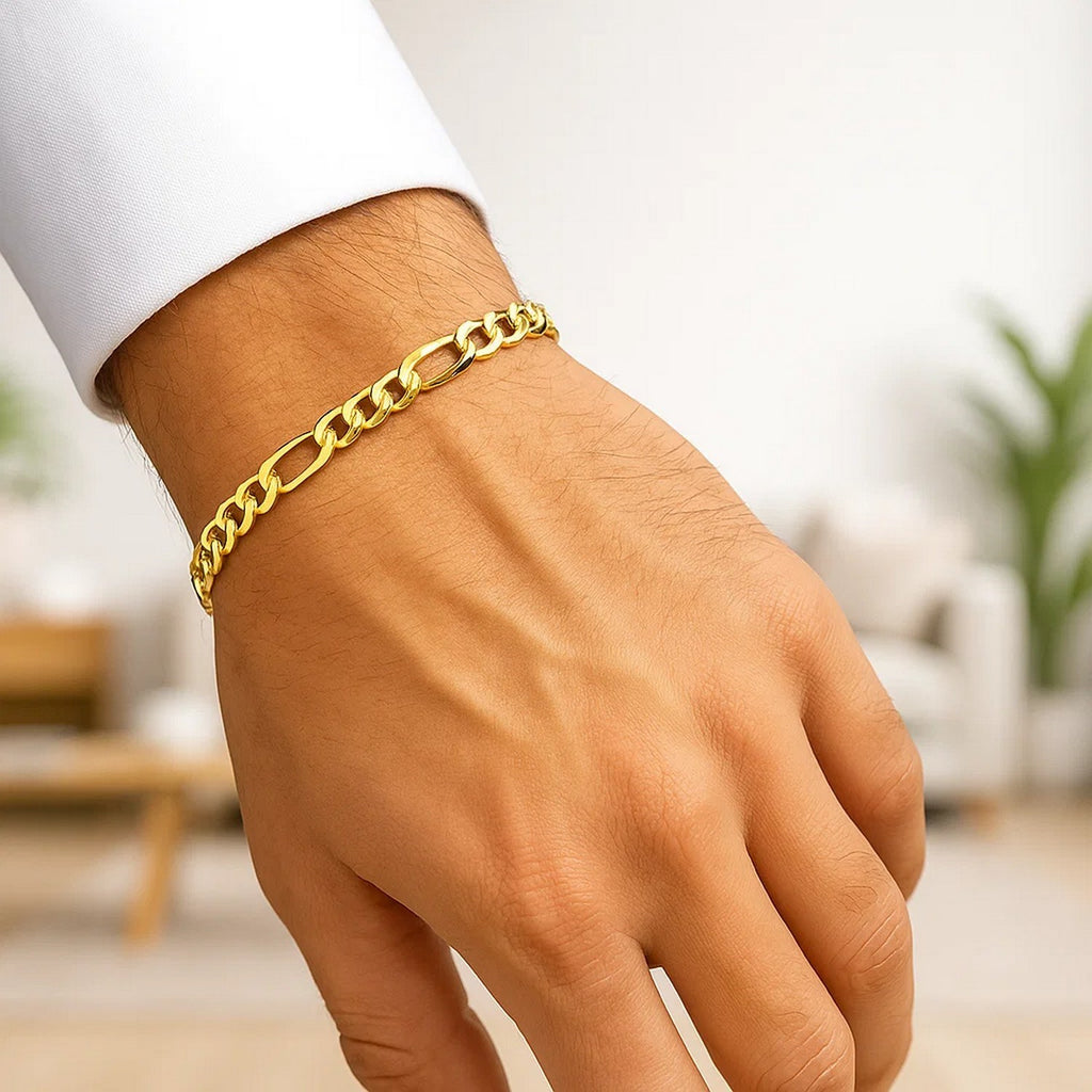 14k Yellow Gold Lite Figaro Bracelet (5.60 mm) - Angle View | BIJOLINA