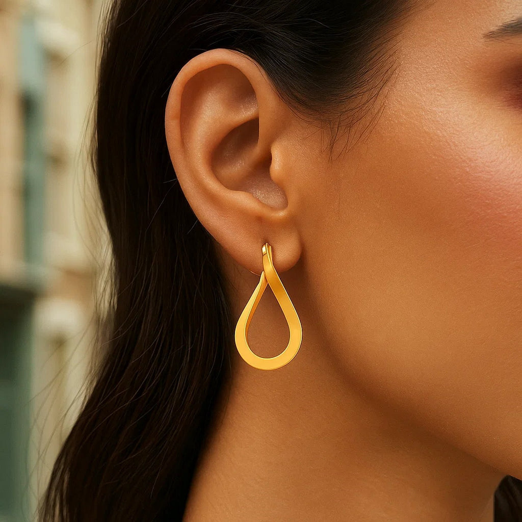 14k Yellow Gold Flat Polished Twisted Hoop Earrings - Side View | BIJOLINA